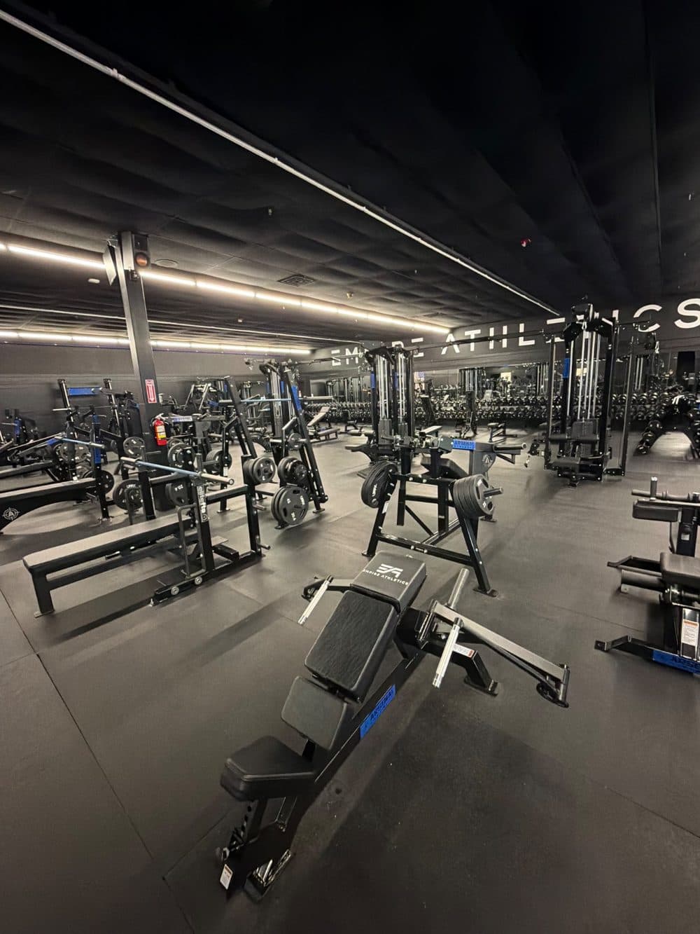Clean weight-training floor and equipment at a Worcester County gym serviced by Viera Cleaning Solutions